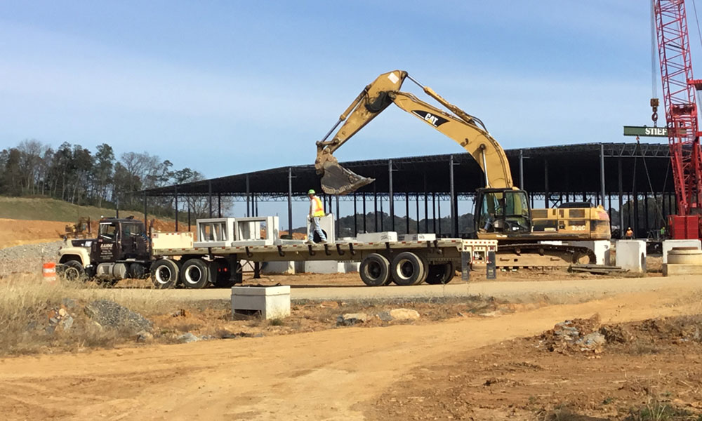 Active construction site with a backhoe