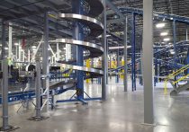 Geodis warehouse interior view with conveyor and automation systems