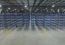 Liberty warehouse interior with lines of shelving units