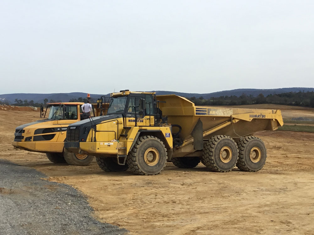 Construction vehicles on an active construction site